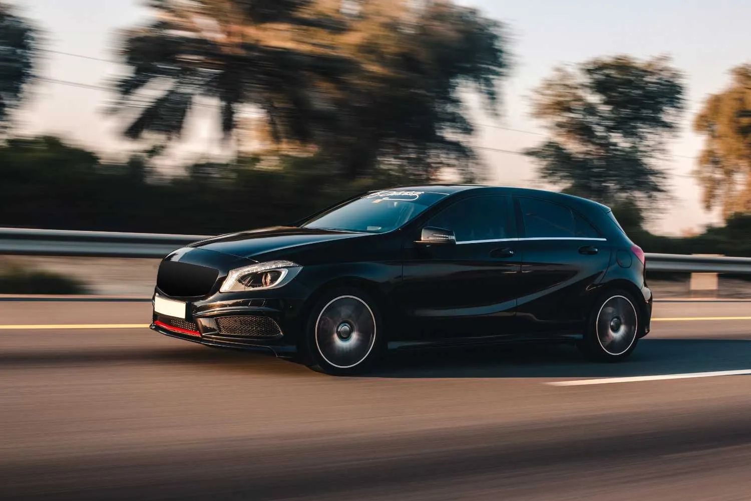 Car moving along an open road